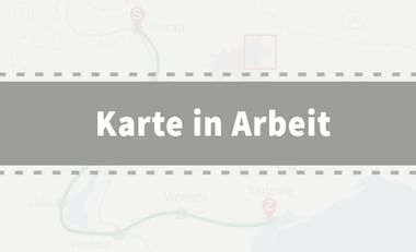 Grauer Platzhalter mit weißem Text 'Karte in Arbeit' und gepunkteten Rahmenlinien, die den Arbeitsfortschritt anzeigen.