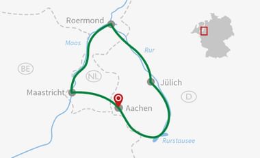 Radrouten-Karte um die Region Aachen Karte mit grüner Radroute zwischen Roermond, Maastricht, Aachen und Jülich. Roter Marker zeigt Aachen mit kleiner Deutschland-Karte.