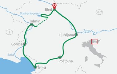 Karte mit Radroute von Bled über Tolmin, Gorizia, Triest, Postojna und Ljubljana in Slowenien und Italien. Grüne Linie markiert die Route.