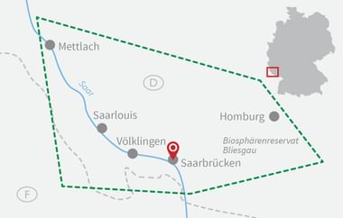Map of Saarland cycling route with green dashed triangle connecting Mettlach, Homburg and Saarbrücken along the Saar river.