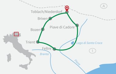 Radrouten-Karte um Piave di Cadore Karte mit einer kreisförmigen Radroute, die Orte wie Toblach/Niederdorf, Brixen, Bozen, Trient und Feltre um Piave di Cadore verbindet.